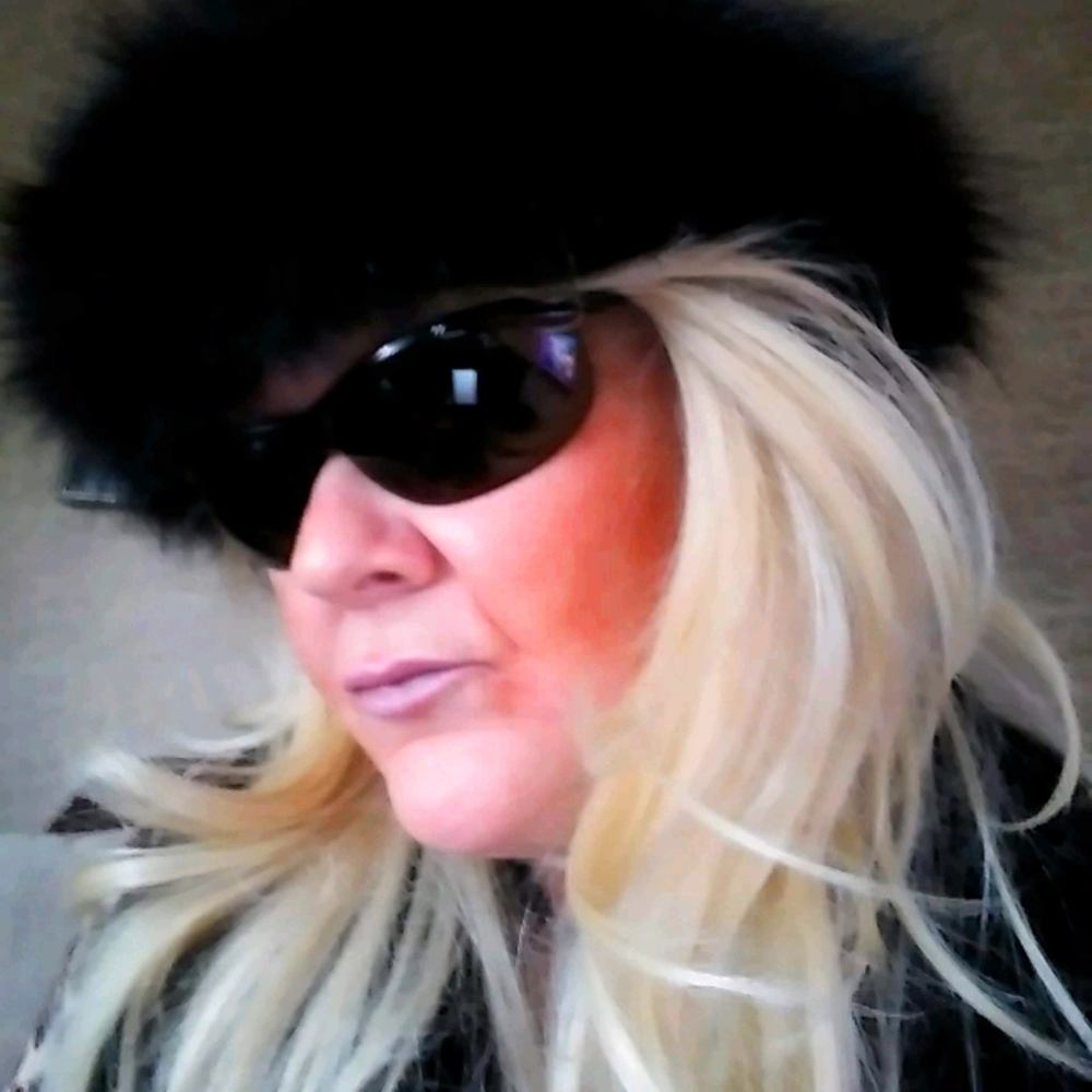 Black fox fur tie on cap